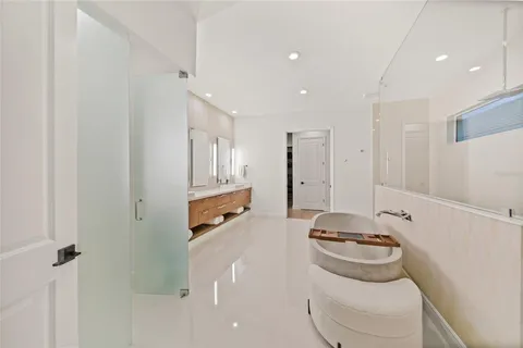 a utility room with multiple dryer and washer