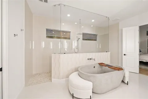 a bathroom with a sink toilet and mirror