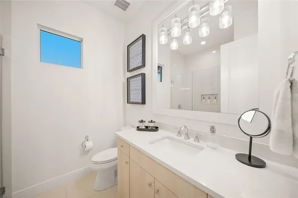 a view of a chairs and table in the patio