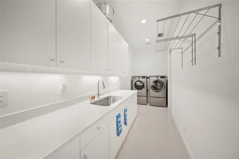 an aerial view of a house with outdoor space