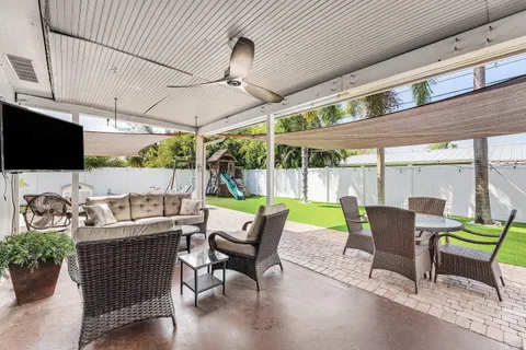 a building outdoor space with patio furniture