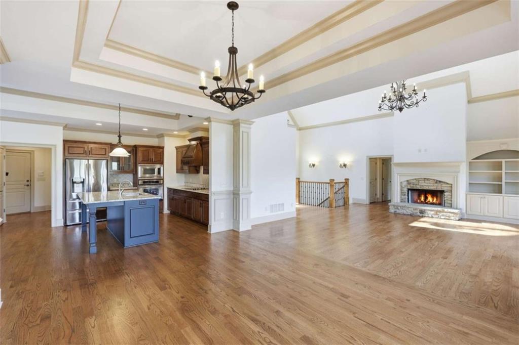 5264 Laurel Circle Gainesville, GA 30506 - Photo 15 of 47 a view of dining room with wooden floor and chandelier