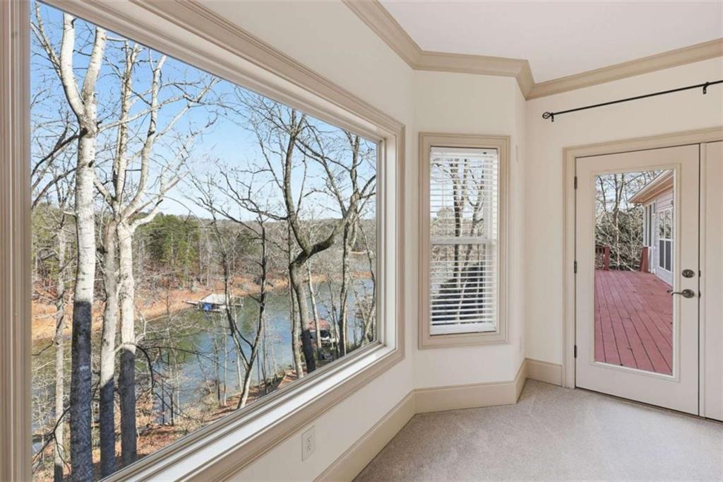 5264 Laurel Circle Gainesville, GA 30506 - Photo 20 of 47 a view of a room with a large window and front door