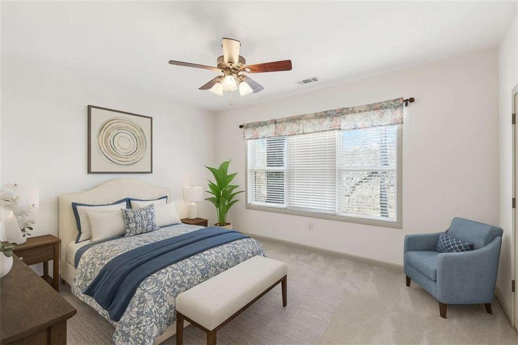 5264 Laurel Circle Gainesville, GA 30506 - Photo 29 of 47 a bedroom with a large bed and a window