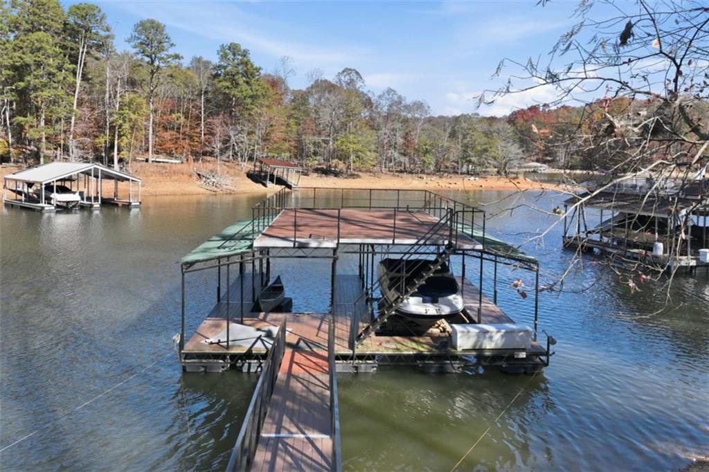 5264 Laurel Circle Gainesville, GA 30506 - Photo 3 of 47 a view of a lake with chairs