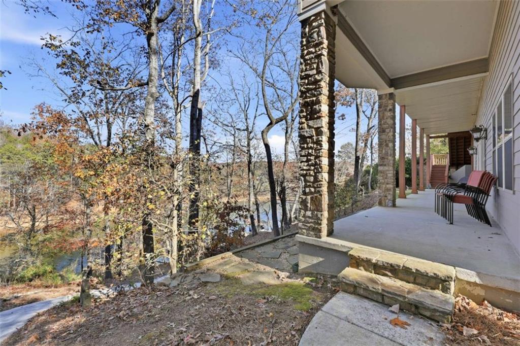 5264 Laurel Circle Gainesville, GA 30506 - Photo 33 of 47 a view of a porch with a yard