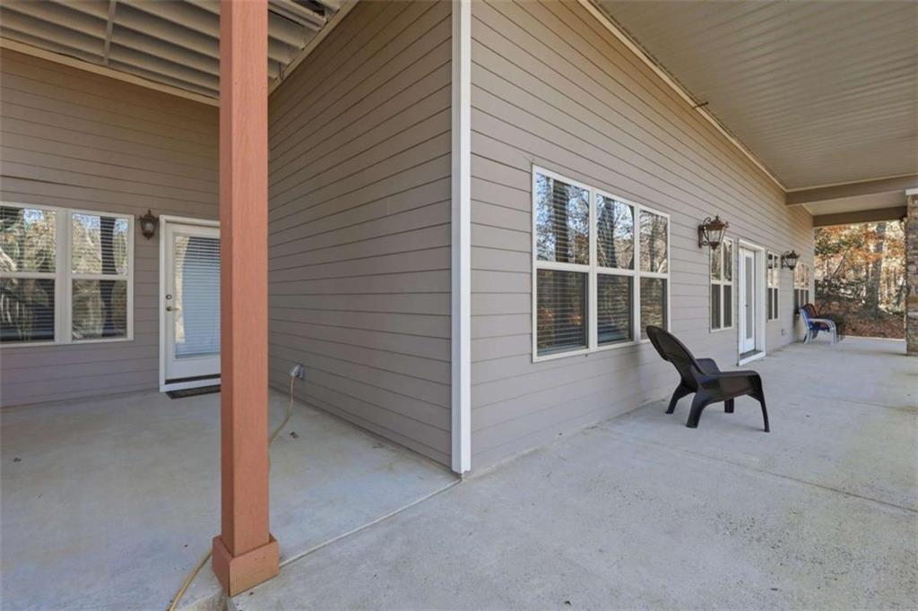 5264 Laurel Circle Gainesville, GA 30506 - Photo 35 of 47 a view of a house with backyard and sitting area