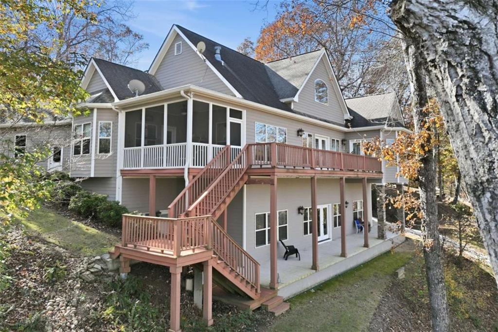 5264 Laurel Circle Gainesville, GA 30506 - Photo 39 of 47 a roof deck with a table and chairs