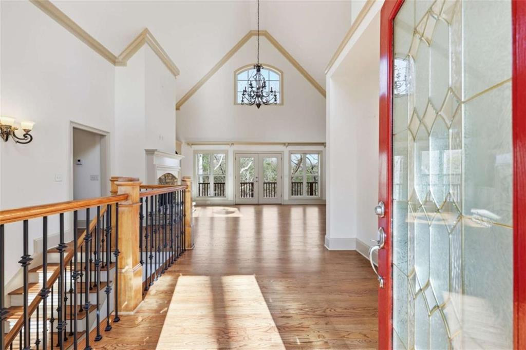 5264 Laurel Circle Gainesville, GA 30506 - Photo 4 of 47 a view of a hallway with wooden floor and windows