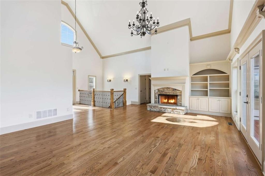 5264 Laurel Circle Gainesville, GA 30506 - Photo 5 of 47 a view of livingroom with fireplace wooden floor and window