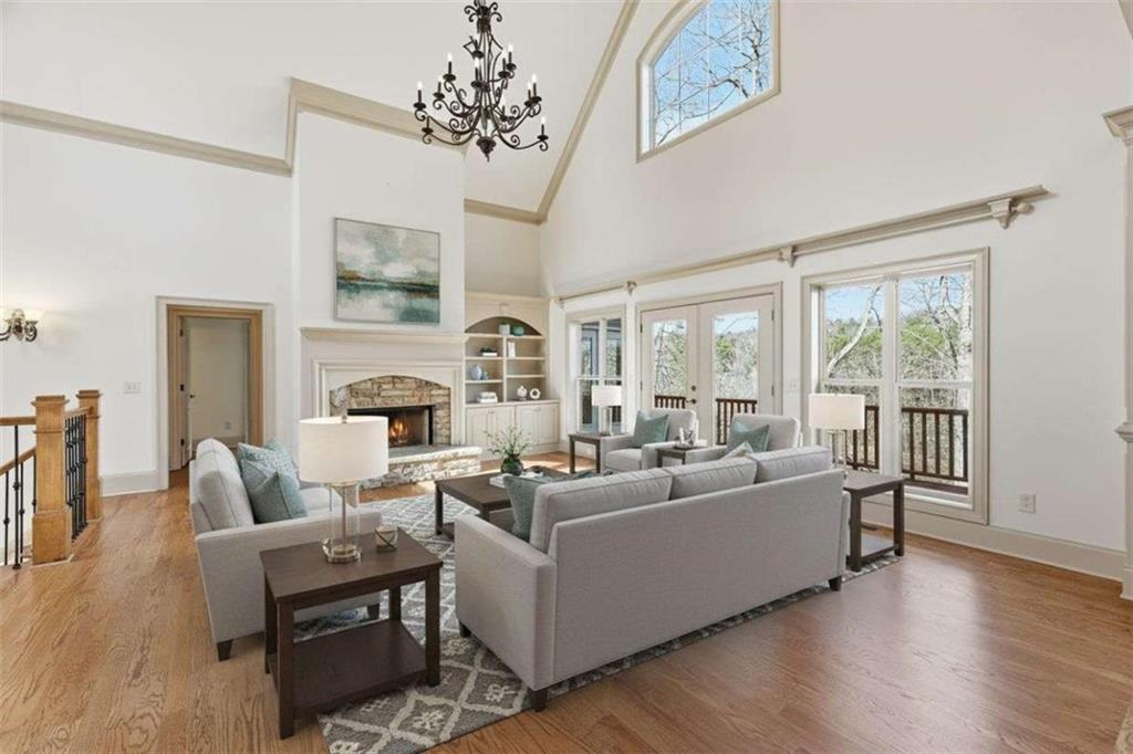5264 Laurel Circle Gainesville, GA 30506 - Photo 6 of 47 a living room with furniture large window and wooden floor