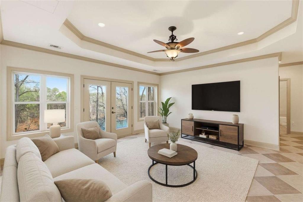 5264 Laurel Circle Gainesville, GA 30506 - Photo 8 of 47 a living room with furniture and a flat screen tv