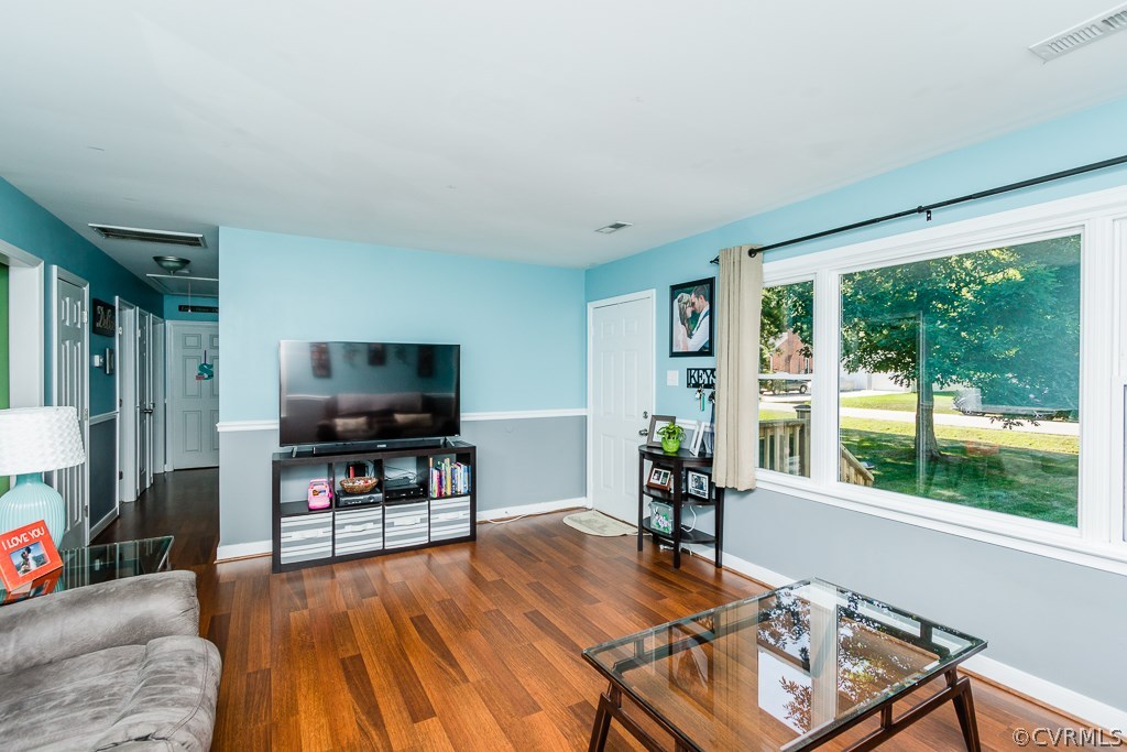 10236 Ridgerun Road Chesterfield, VA 23832 - Photo 3 of 18 a living room with furniture and a flat screen tv