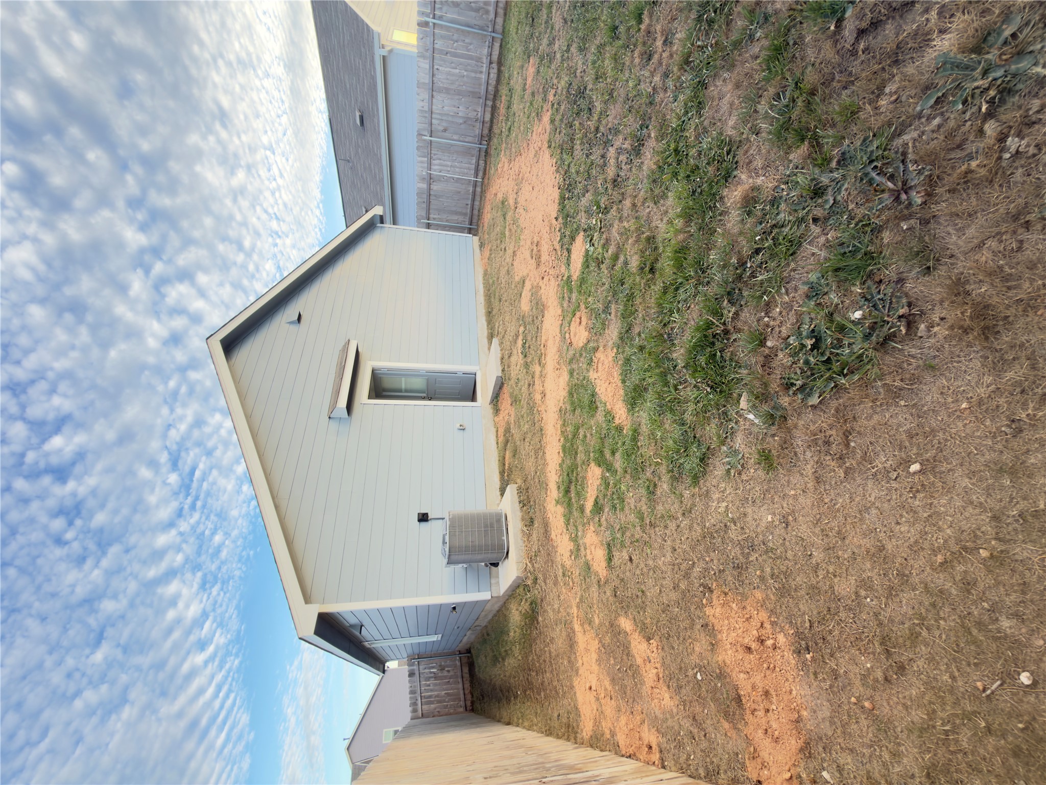 13336 Illumination Road Elgin, TX 78621 - Photo 11 of 15 a view of an empty room with closet