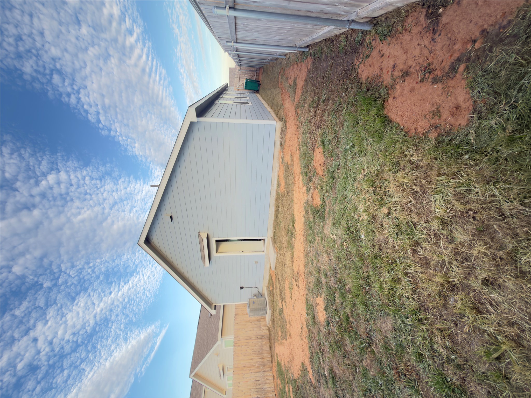 13336 Illumination Road Elgin, TX 78621 - Photo 15 of 15 a view of a house with a yard