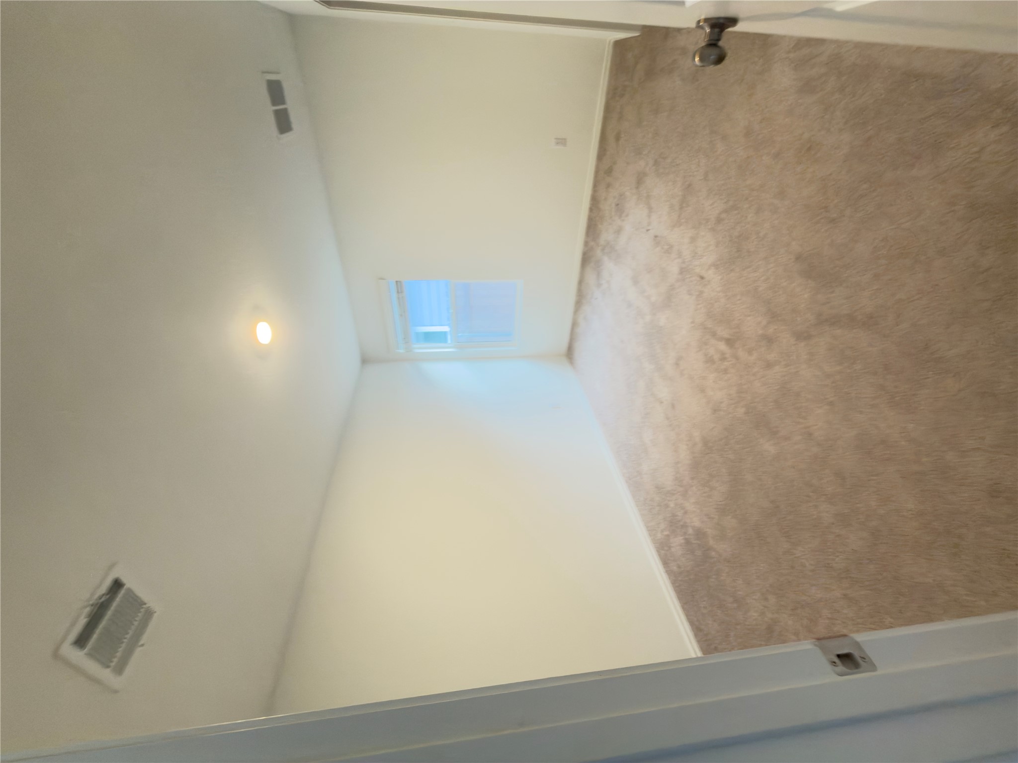 13336 Illumination Road Elgin, TX 78621 - Photo 4 of 15 an empty room with a natural light