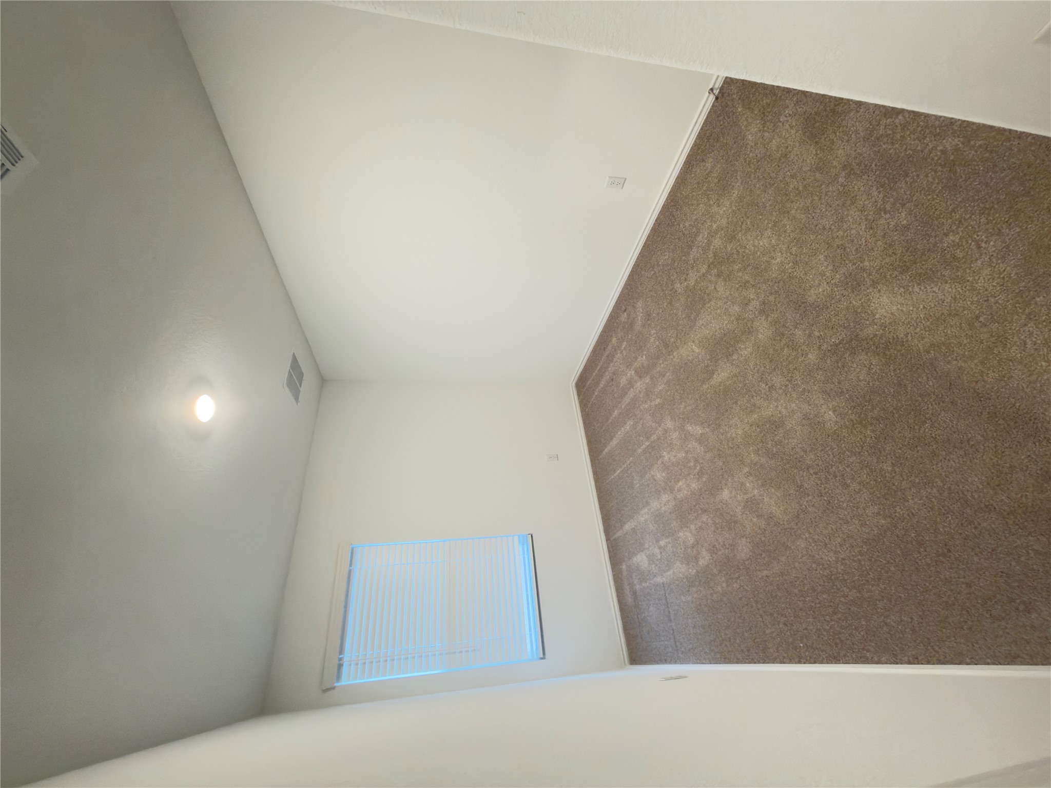 13336 Illumination Road Elgin, TX 78621 - Photo 10 of 15 an empty room with a empty space and window