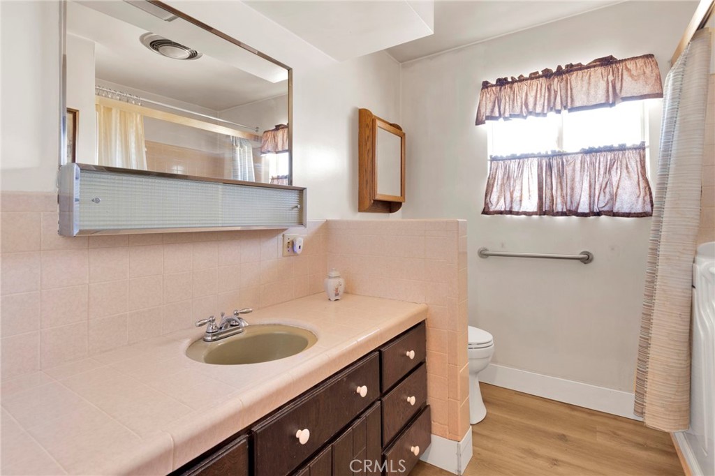 5500 Oil Well Road Phelan, CA 92371 - Photo 30 of 65 a bathroom with a sink and a mirror