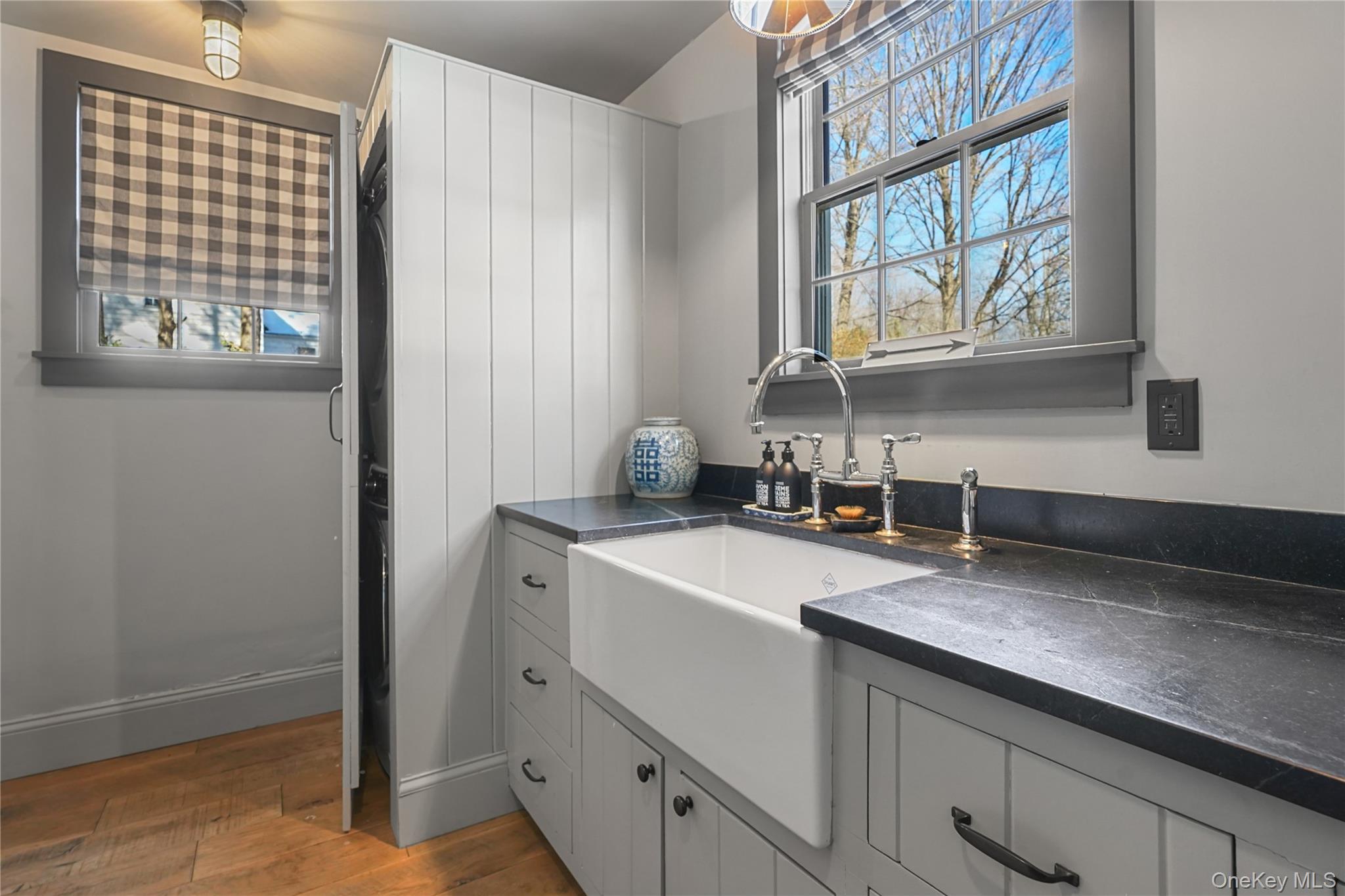 259 Westchester Avenue Pound Ridge, NY 10576 - Photo 15 of 21 a kitchen with a sink and a window