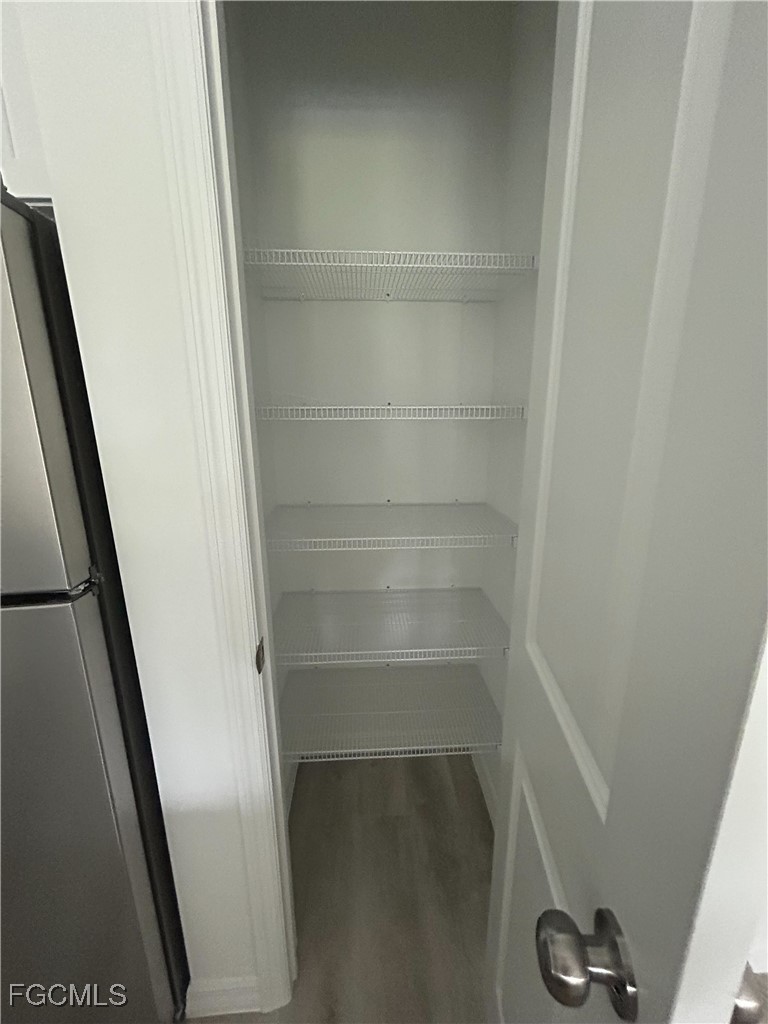 449 Bell Boulevard Lehigh Acres, FL 33974 - Photo 19 of 21 a view of closet