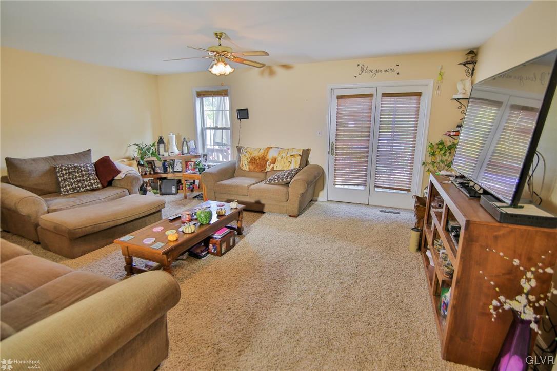 247 Flint Hill Road Alburtis, PA 18011 - Photo 4 of 26 Spacious living room with plenty of sunlight.