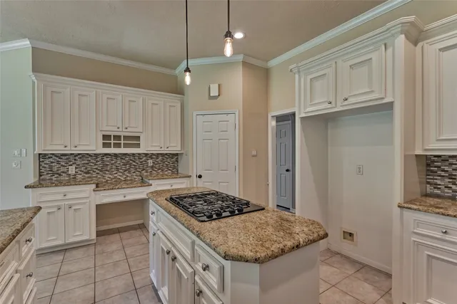 a view of a livingroom with an empty room and windows