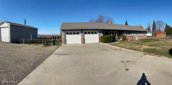 a view of house with outdoor space
