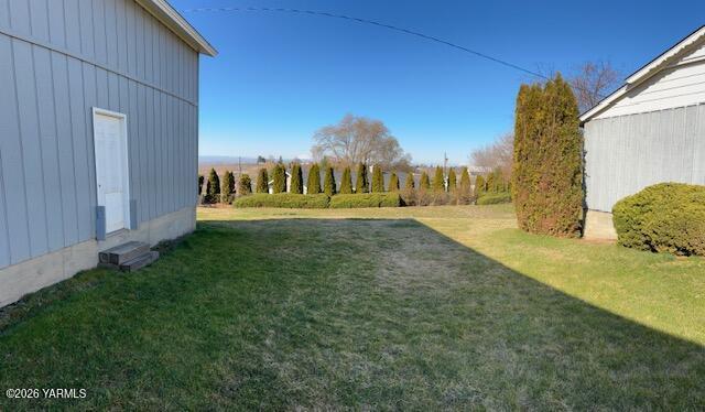 1662 South Euclid Road Grandview, WA 98930 - Photo 15 of 15 a view of a back yard of the house
