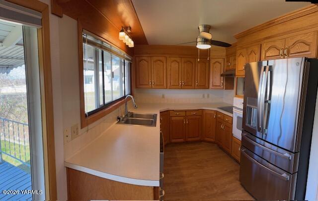 1662 South Euclid Road Grandview, WA 98930 - Photo 4 of 15 a kitchen with a refrigerator and a sink