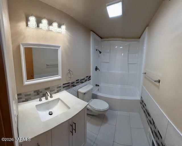 1662 South Euclid Road Grandview, WA 98930 - Photo 9 of 15 a bathroom with a sink a toilet a mirror and shower