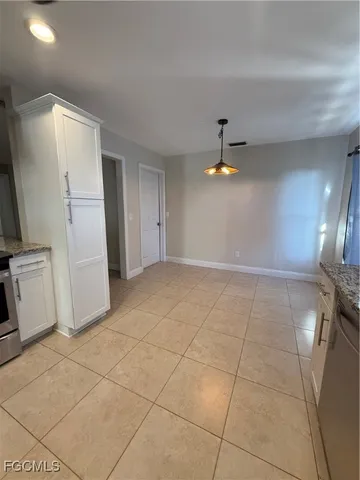 a very nice looking room with a ceiling fan