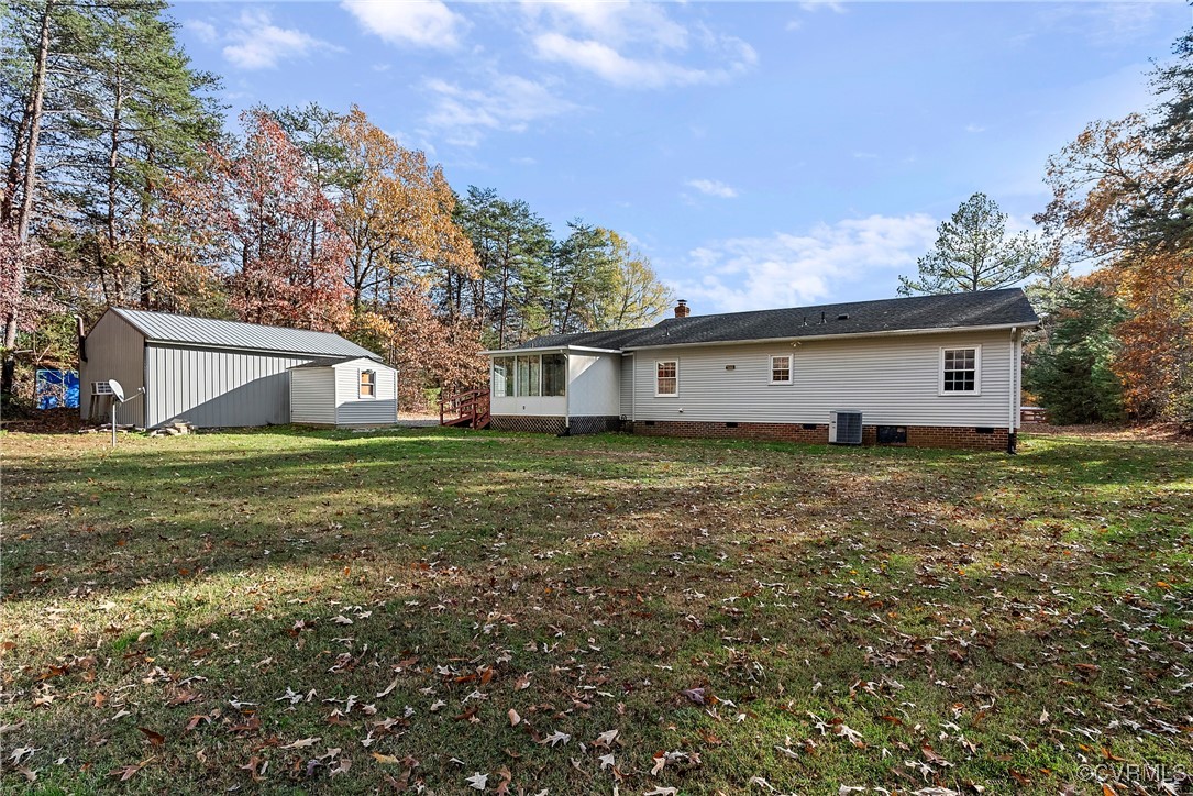 975 Windyknight Road Montpelier, VA 23192 - Photo 31 of 38 Rear view of house featuring central air condition