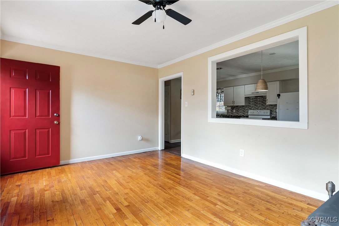 975 Windyknight Road Montpelier, VA 23192 - Photo 5 of 38 Unfurnished living room with ceiling fan, light wo