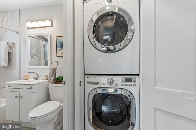 a view of bathroom with a toilet and a sink