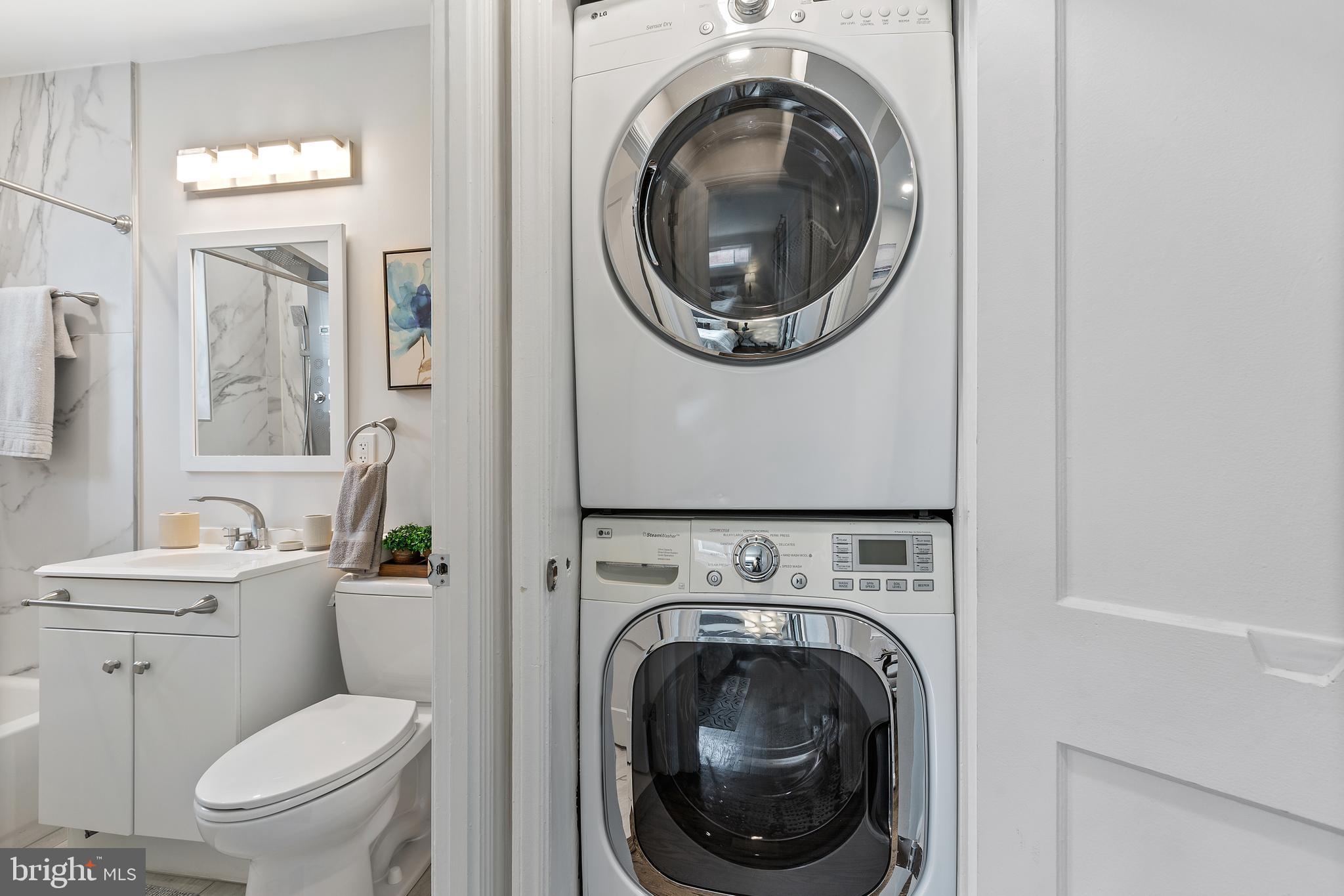 53 Victor Street Northeast, Unit 1 Washington, DC 20011 - Photo 12 of 18 a view of bathroom with a toilet and a sink