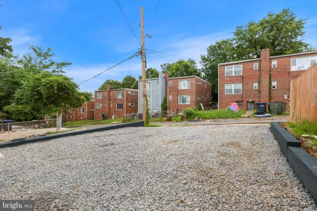 a view of a street with a building in the background