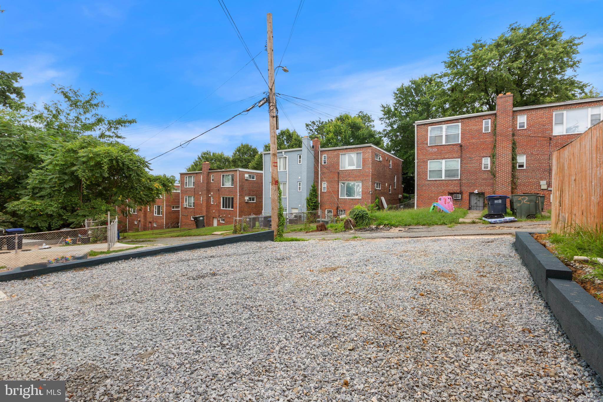 53 Victor Street Northeast, Unit 1 Washington, DC 20011 - Photo 17 of 18 a view of a street with a building in the background