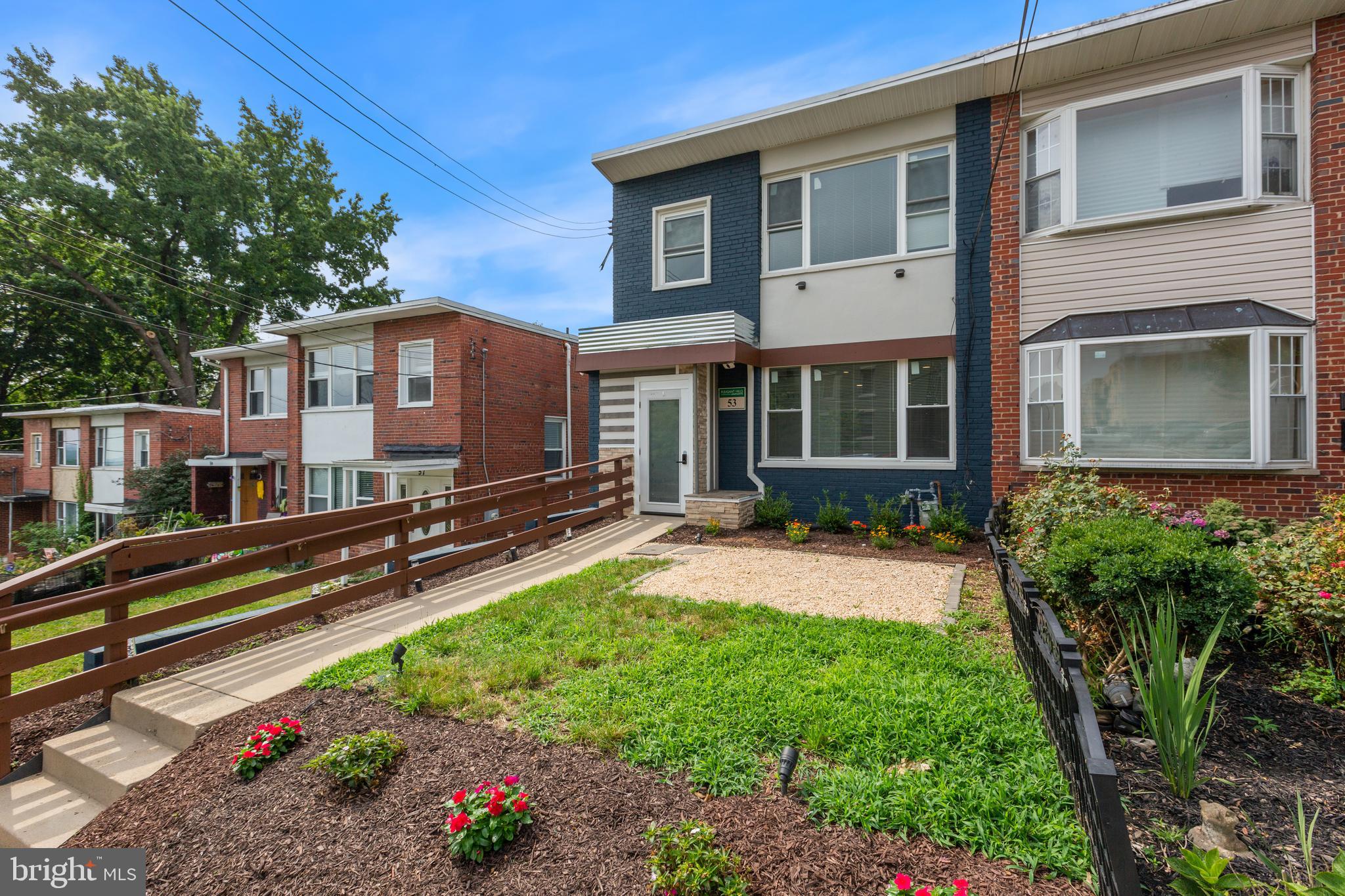 53 Victor Street Northeast, Unit 1 Washington, DC 20011 - Photo 3 of 18 a view of a house with backyard and sitting area