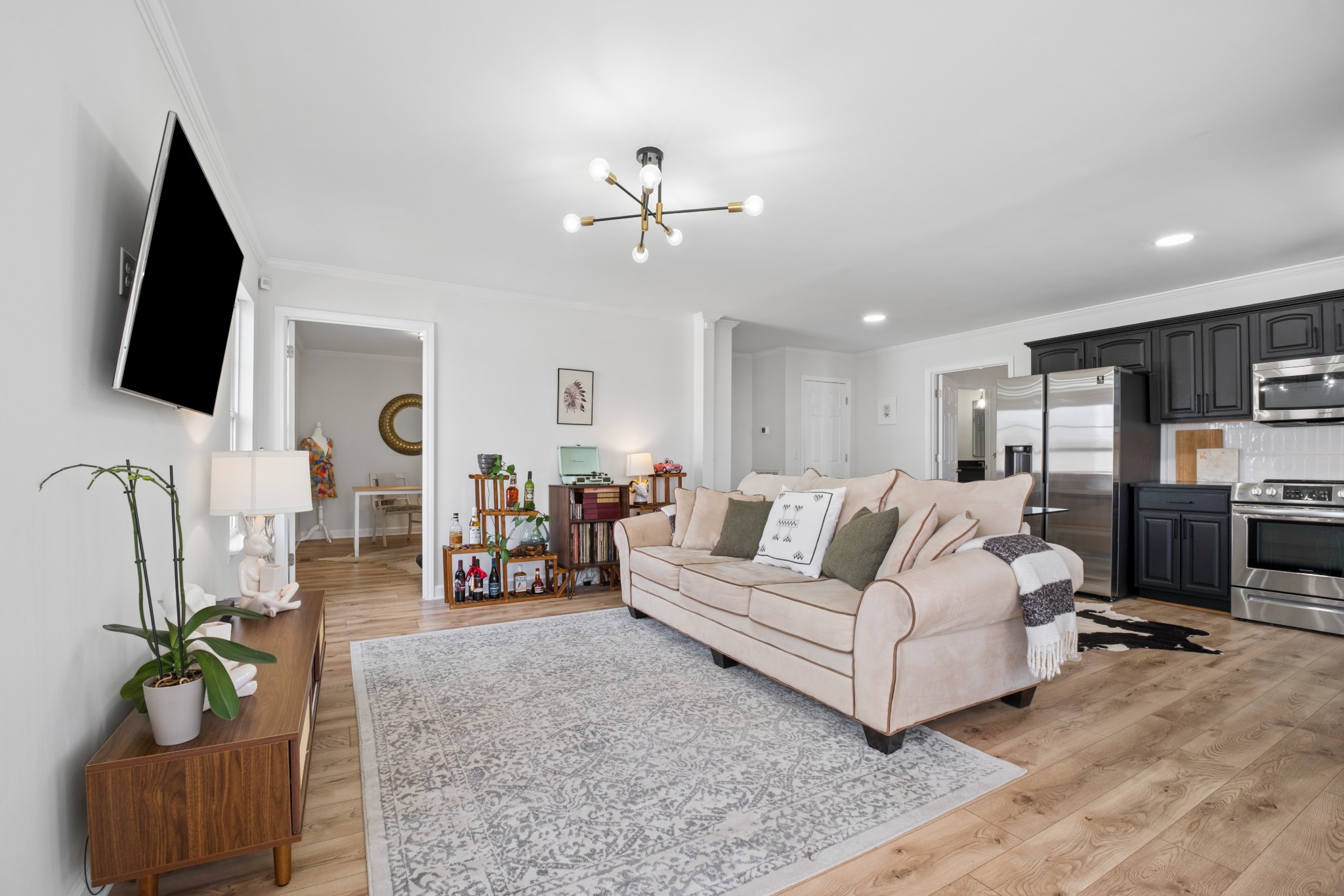 2418 Abbott Martin Road Nashville, TN 37215 - Photo 2 of 54 a living room with furniture and a flat screen tv