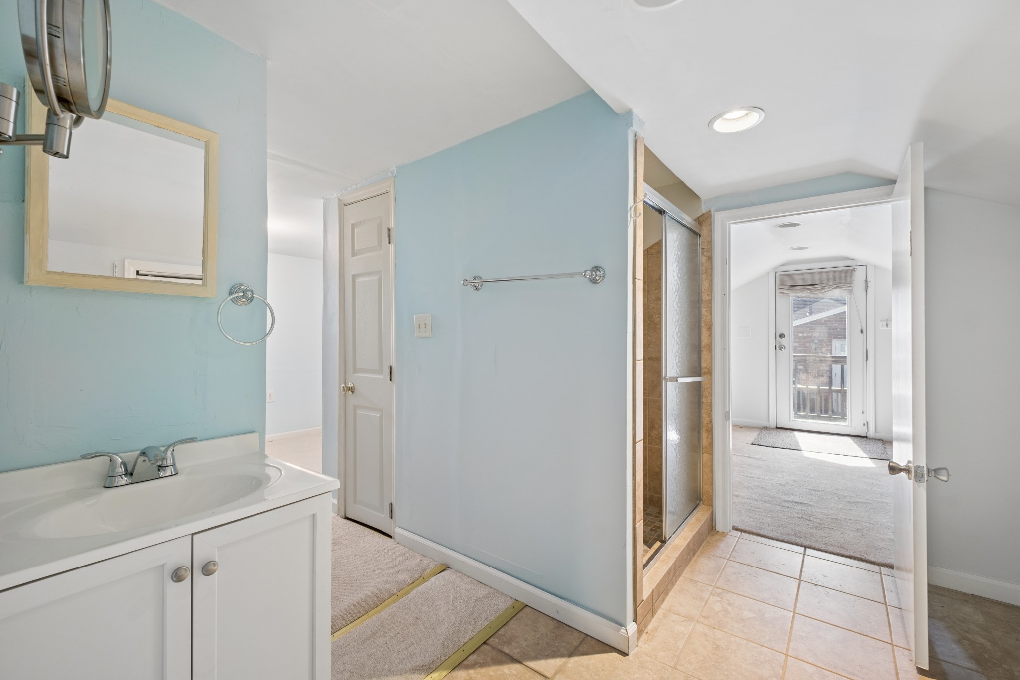 2418 Abbott Martin Road Nashville, TN 37215 - Photo 34 of 54 a bathroom with a sink and a mirror