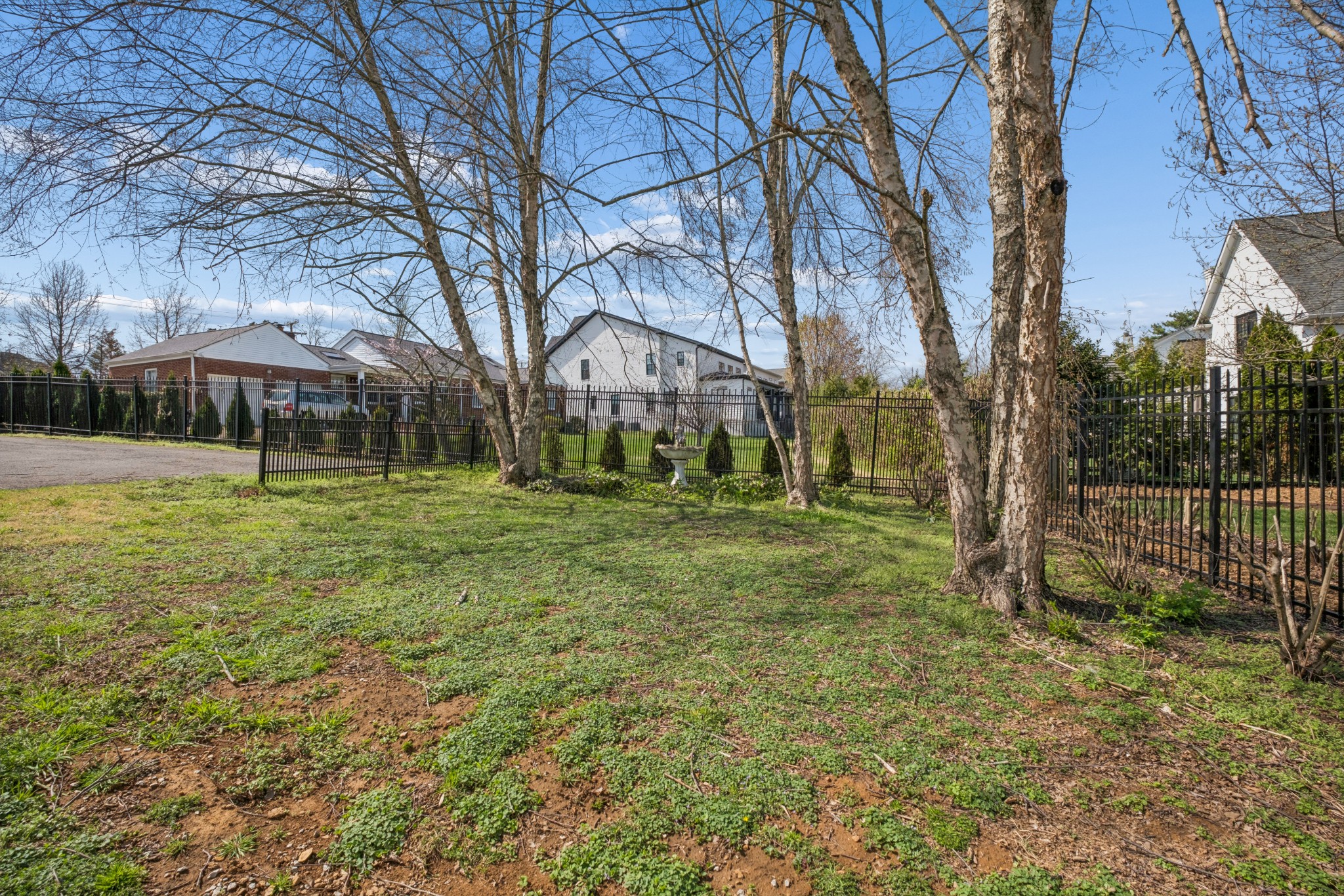 2418 Abbott Martin Road Nashville, TN 37215 - Photo 42 of 54 a backyard of a house with lots of green space