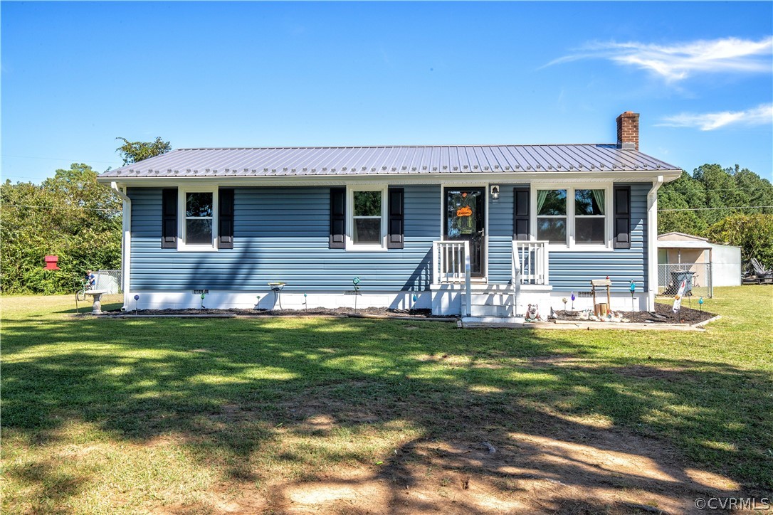 16907 Courthouse Road Dinwiddie, VA 23841 - Photo 2 of 15 a front view of house with yard