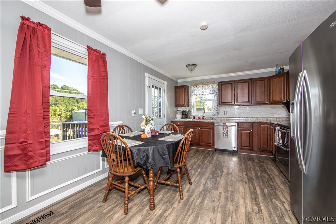 16907 Courthouse Road Dinwiddie, VA 23841 - Photo 7 of 15 a view of a dining room with furniture and a window