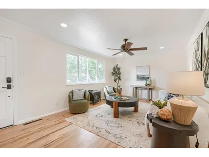 a living room with furniture and a window