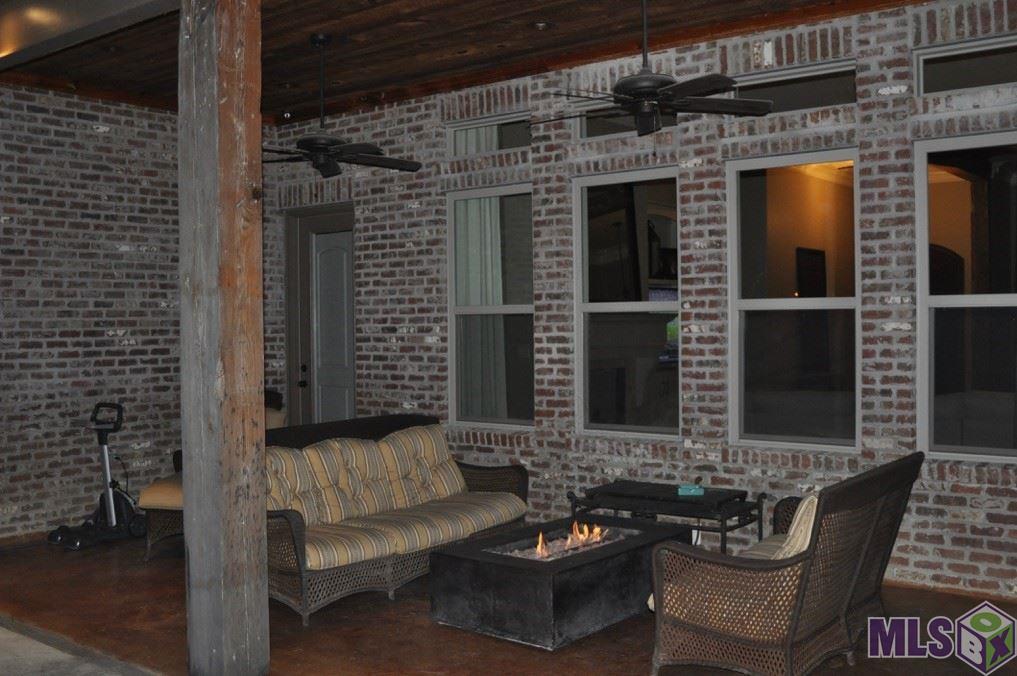 25837 Wax Road Denham Springs, LA 70726 - Photo 42 of 44 Night view of rear patio with gas firepit