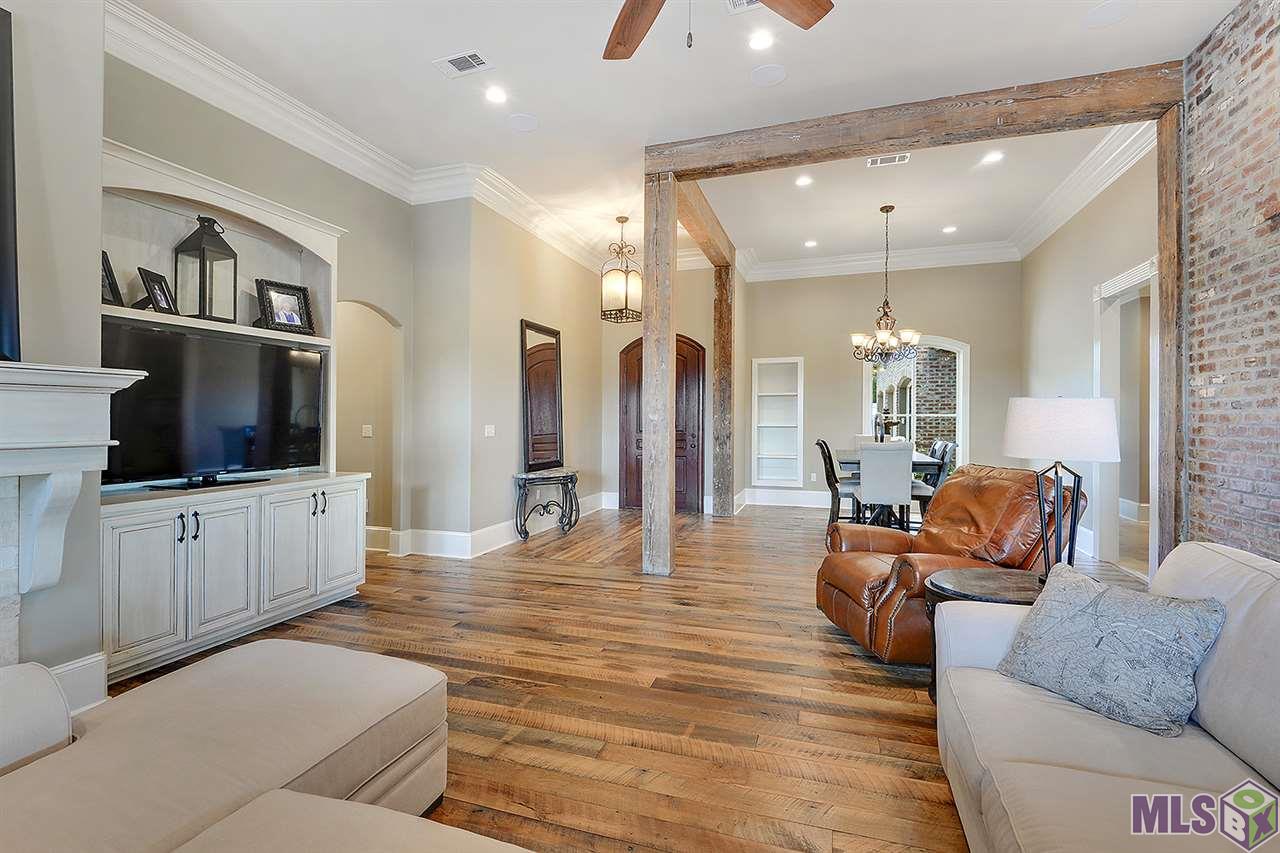 25837 Wax Road Denham Springs, LA 70726 - Photo 6 of 44 Brick arches separating den and kitchen