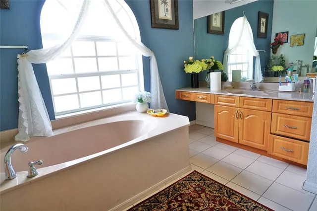 a view of swimming pool with lounge chair