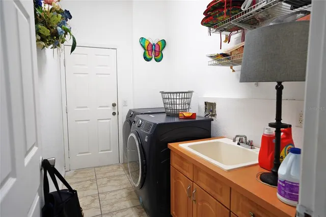 a view of a swimming pool with a yard