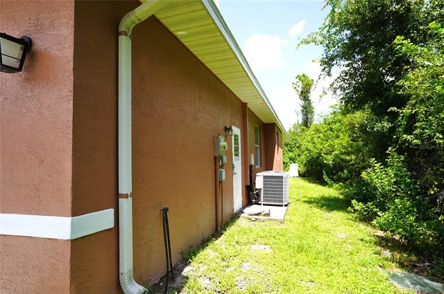 an aerial view of city and green space