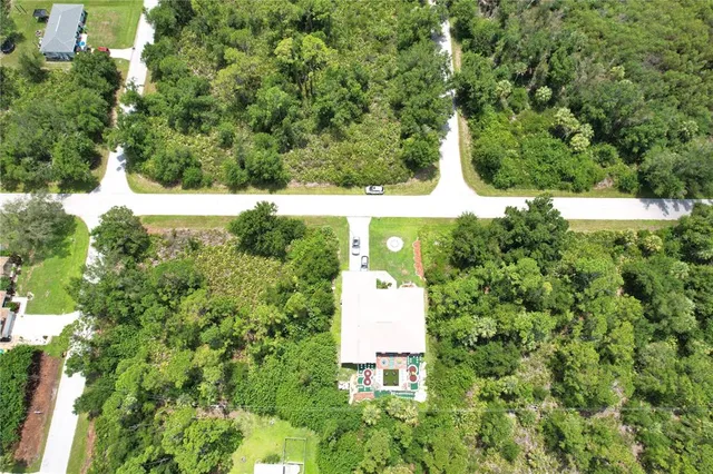 a view of balcony with wooden floor and fence